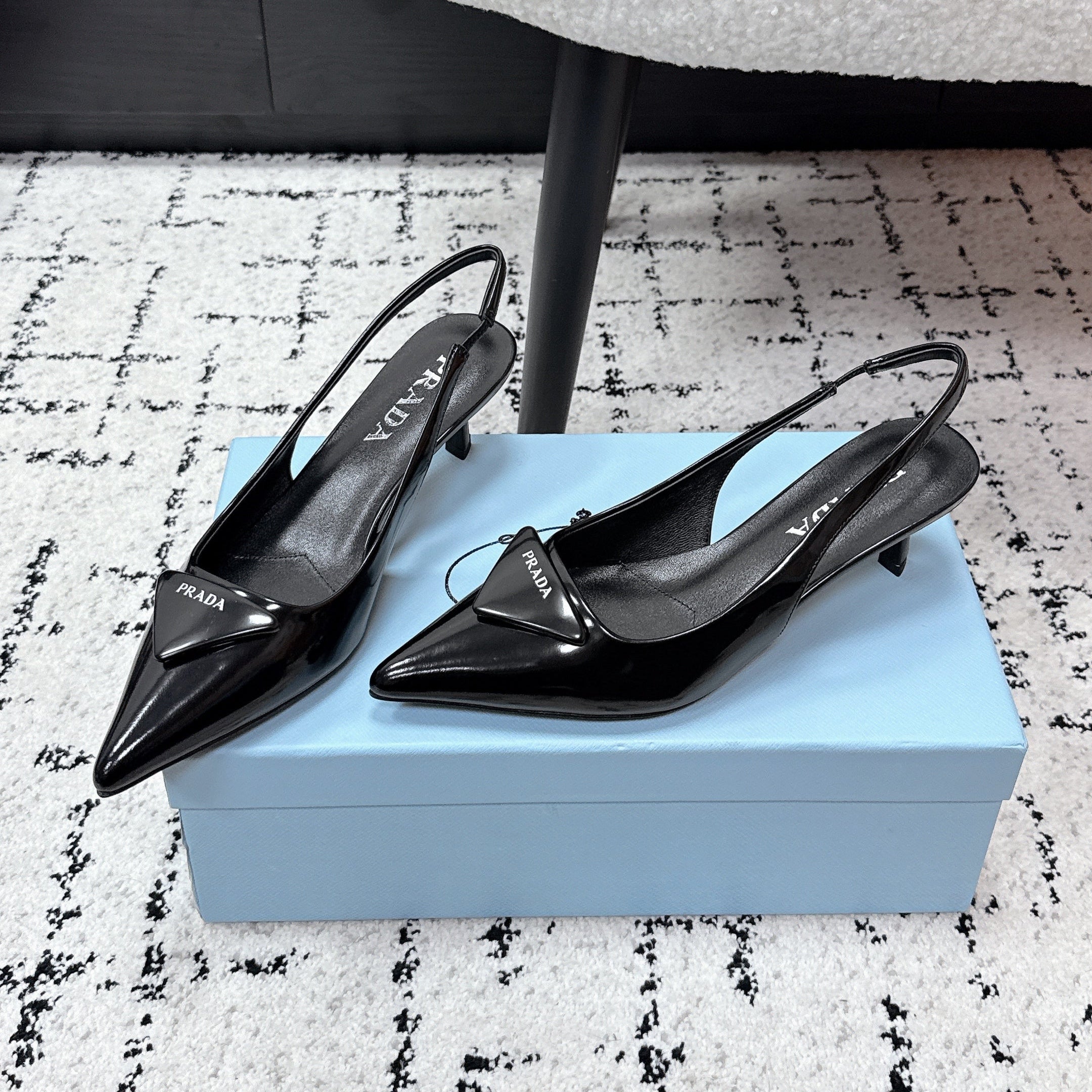 PRADA 26S SLINGBACK PUMPS 60MM IN BLACK PATENT CALFSKIN