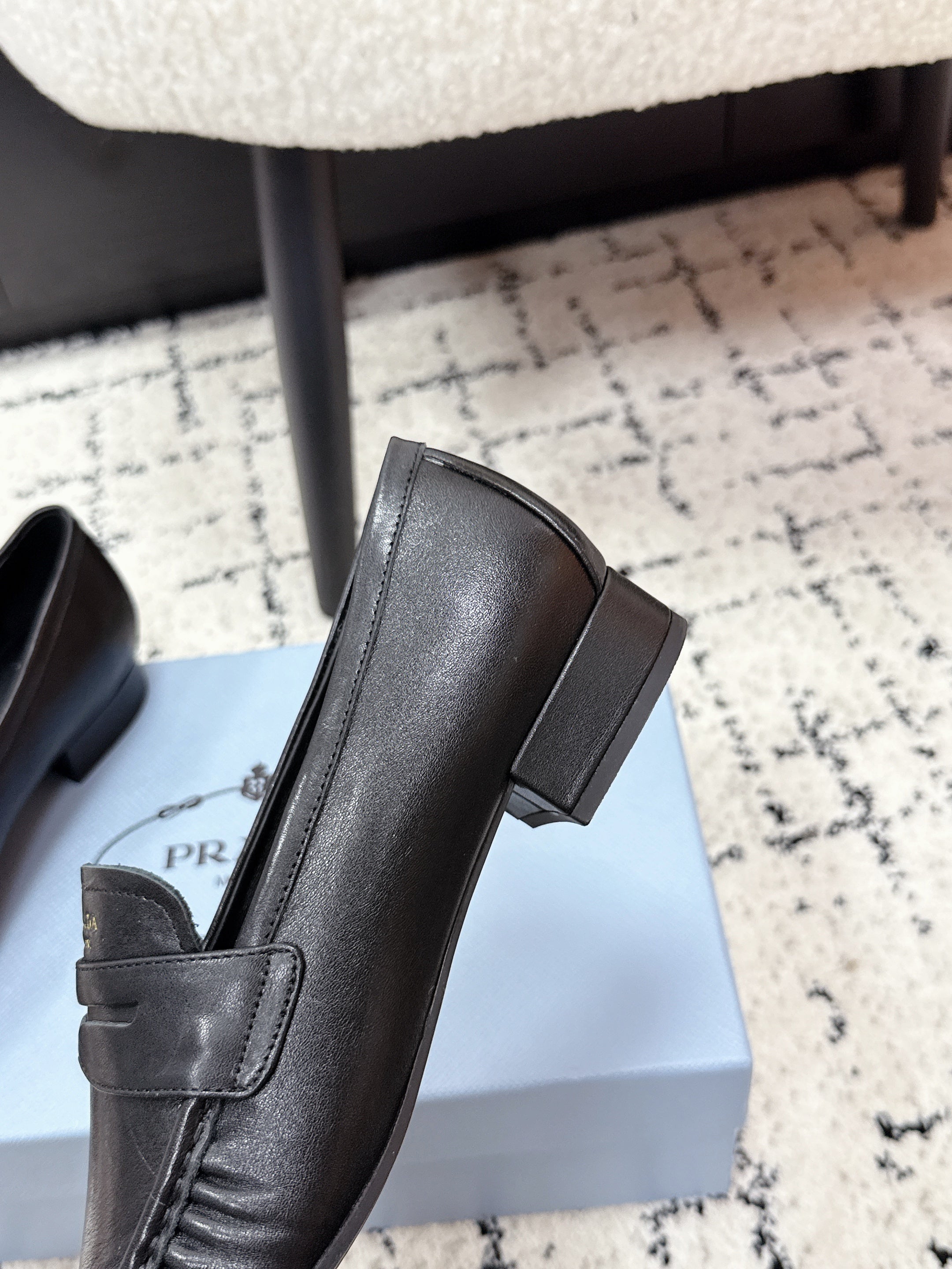 PRADA 26S LOAFERS 25MM IN BLACK CALFSKIN