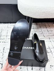 CHANEL 26S LOAFERS IN BLACK SMOOTH CALFSKIN WITH CC LOGO