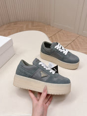 PRADA 26S PLATFORM SNEAKERS 50MM IN DARK GREY SUEDE