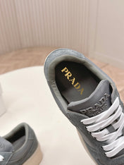 PRADA 26S PLATFORM SNEAKERS 50MM IN DARK GREY SUEDE