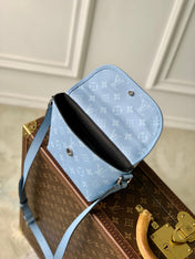 PULSE MESSENGER 22.5 IN BLUE MONOGRAM COATED CANVAS AND CALFSKIN