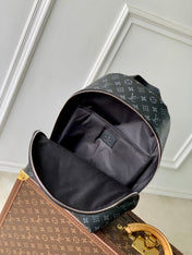 DISCOVERY SLIM BACKPACK 38 IN BLACK MONOGRAM ECLIPSE COATED CALFSKIN