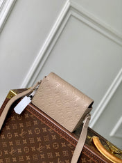 STEAMER WEARABLE WALLET 18 IN LIGHT BROWN MONOGRAM TAURILLON CALFSKIN
