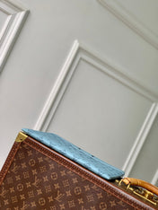 POCHETTE TO GO 30 IN SKY BLUE MONOGRAM SHADOW CALFSKIN EMBOSSED LOGO