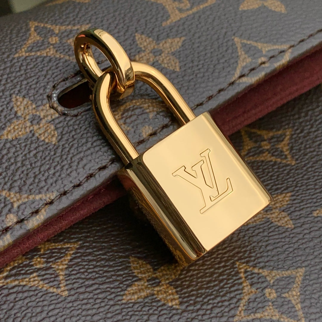 HIDE AWAY MM 36 IN BROWN MONOGRAM COATED CANVAS AND CALFSKIN