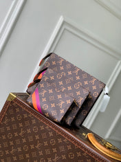 RIO TOILET POUCH 25 IN BROWN CANVAS MONOGRAM GOLD LOCK