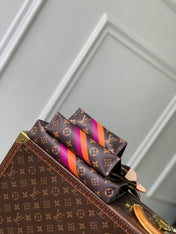 RIO TOILET POUCH 25 IN BROWN CANVAS MONOGRAM GOLD LOCK