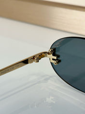 FIRST CRYSTAL RIMLESS OVAL FRAME SUNGLASSES FE4075US IN METAL