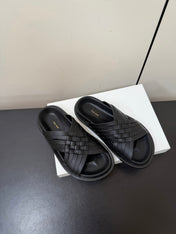 THE ROW 26S CROSS STRAP SANDALS IN BLACK CALFSKIN