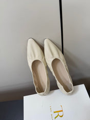 THE ROW 26S POINTED TOE BALLET FLATS IN IVORY WHITE LAMBSKIN