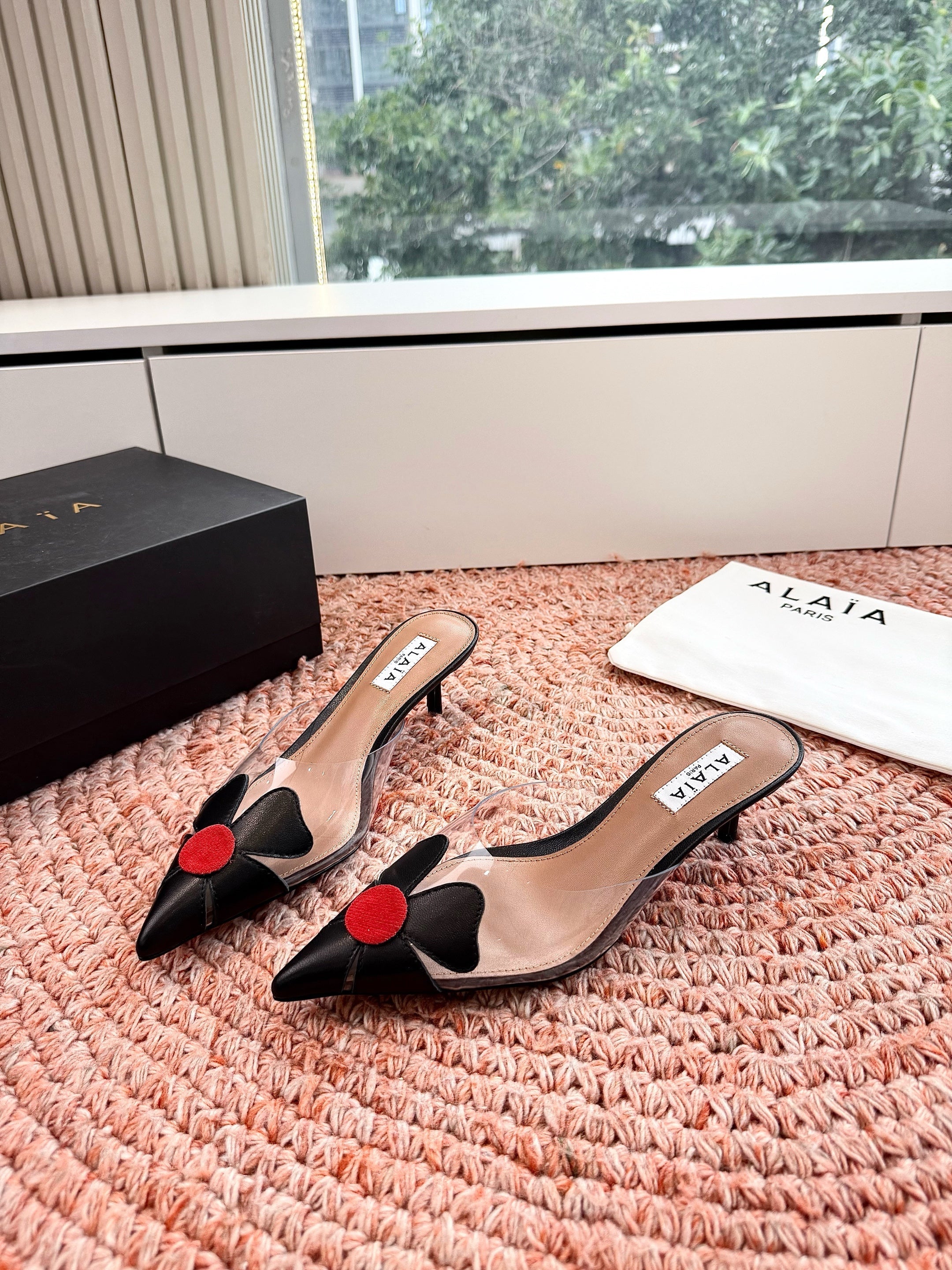ALAIA 26S MULE HEELS IN BLACK LAMBSKIN AND TRANSPARENT PVC