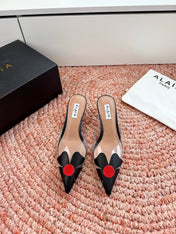 ALAIA 26S MULE HEELS IN BLACK LAMBSKIN AND TRANSPARENT PVC