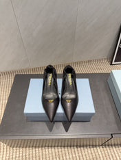 PRADA 26S POINTED TOE PUMPS 55MM IN BLACK SHEEPSKIN WITH LOGO