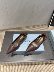 PRADA 26S POINTED TOE PUMPS 55MM IN DARK BROWN SHEEPSKIN WITH LOGO