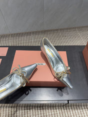 MIUMIU 26S POINTED TOE PUMPS 55MM IN SILVER CALFSKIN WITH BOW