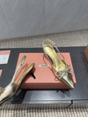 MIUMIU 26S SLINGBACK 55MM IN GOLD CALFSKIN WITH BOW