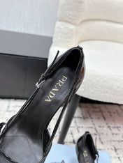 PRADA 26S POINTED-TOE HIGH HEELS 75MM IN BLACK PATENT CALFSKIN WITH BOW