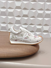 LOEWE 26S FLOW RUNNER SNEAKER IN WHITE FLORAL PATTERN SUEDE AND CALFSKIN