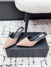 ALAIA 26S HEELED MULES 65 MM IN NUDE PINK GLOSSY CALFSKIN