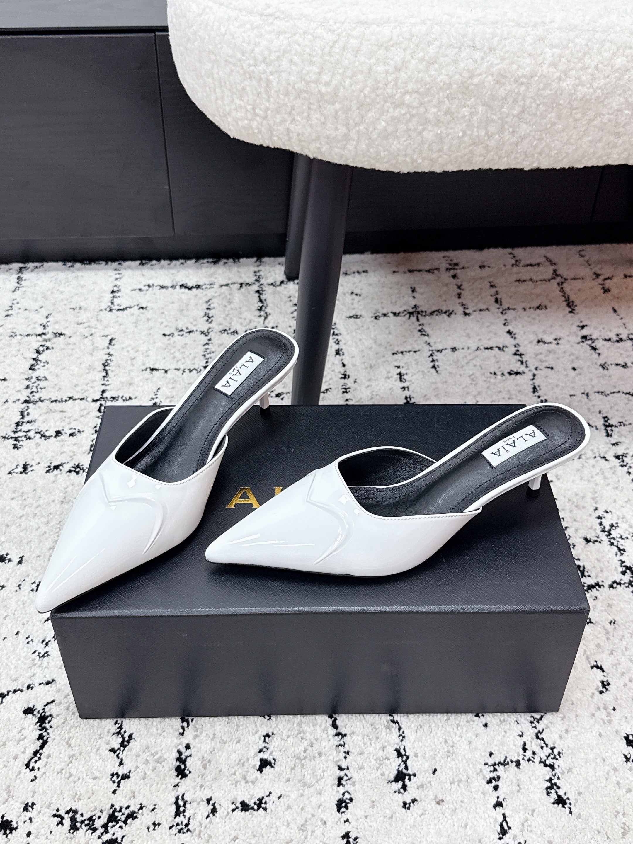 ALAIA 26S HEELED MULES 65 MM IN WHITE GLOSSY CALFSKIN