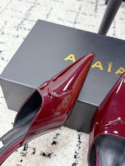 ALAIA 26S HEELED MULES 65 MM IN DARK RED GLOSSY CALFSKIN
