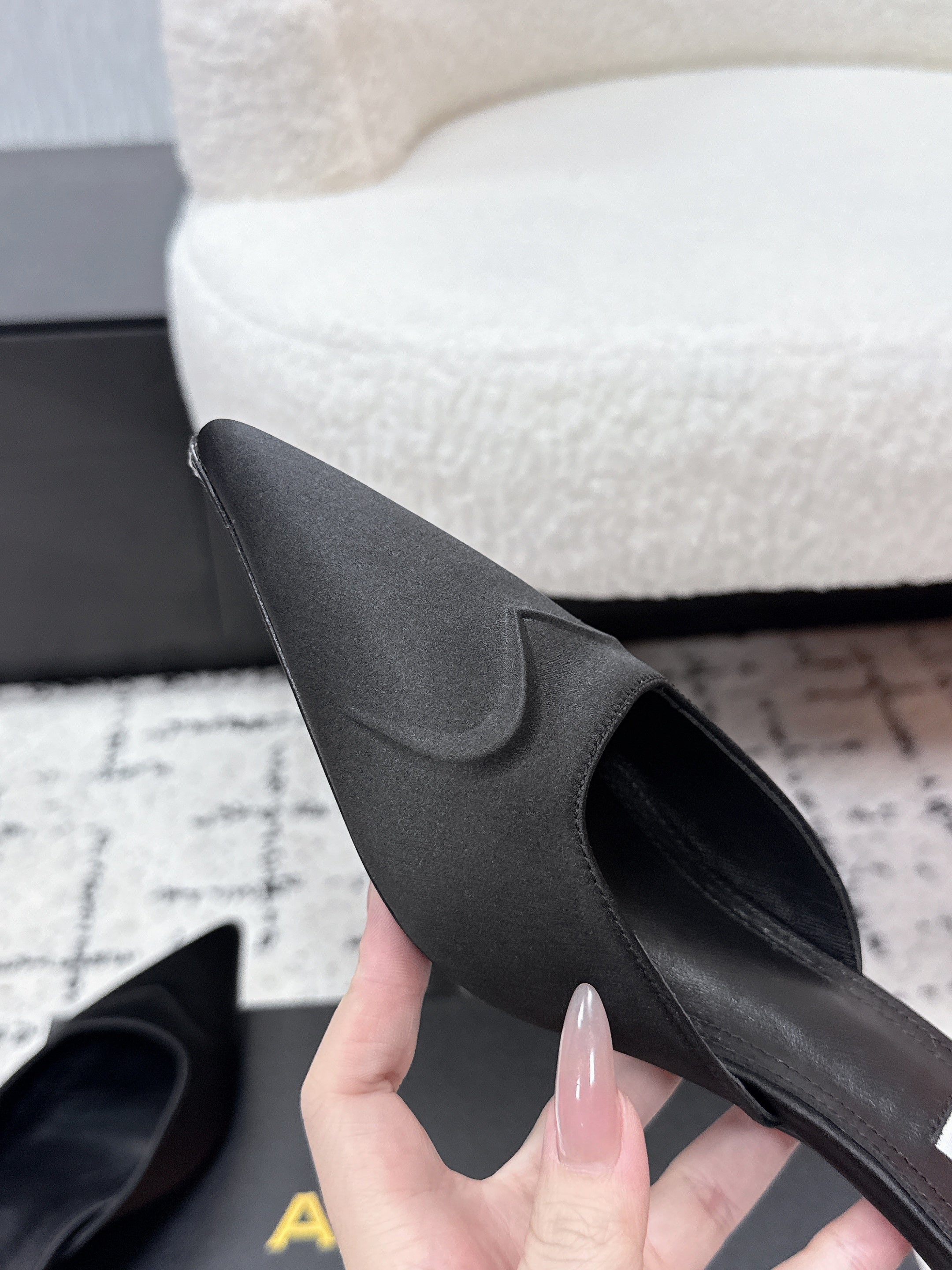 ALAIA 26S HEELED MULES 65 MM IN BLACK SATIN