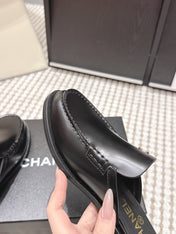 CHANEL 26S LOAFER MULES IN BLACK CALFSKIN