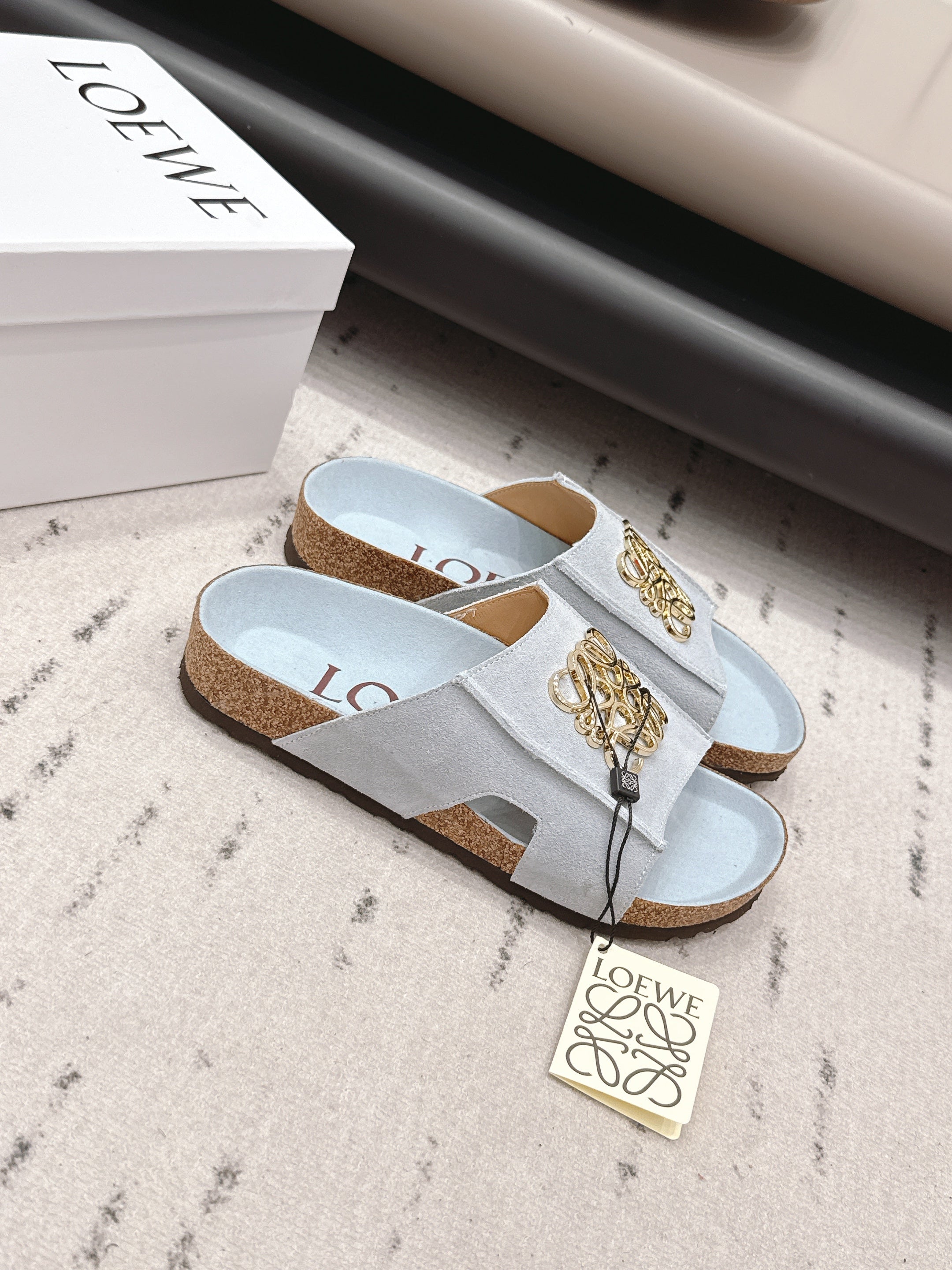 LOEWE 26S FLAT SANDALS IN LIGHT BLUE LOGO GOLD HARDWARE