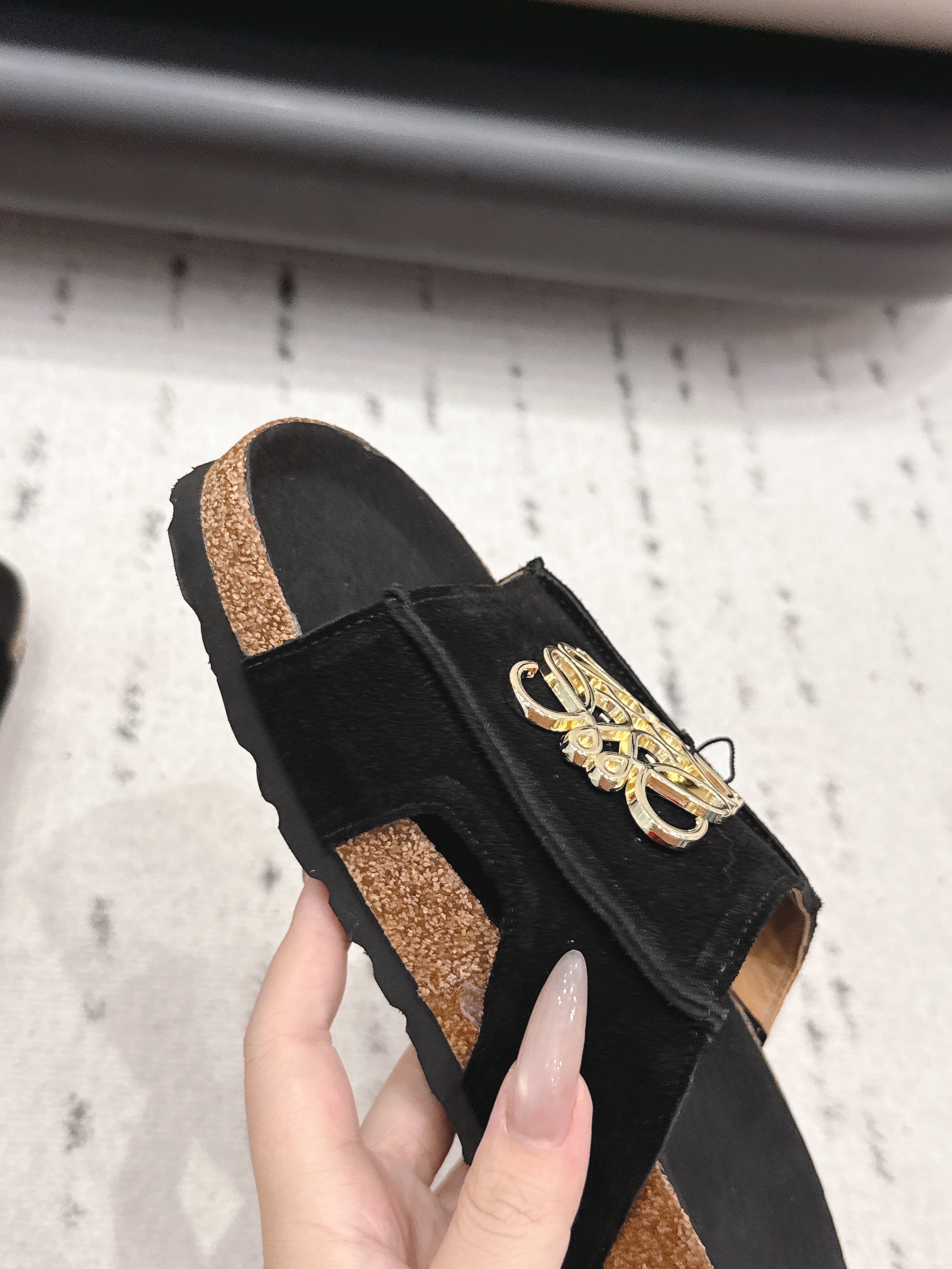 LOEWE 26S FLAT SANDALS IN BLACK LOGO GOLD HARDWARE
