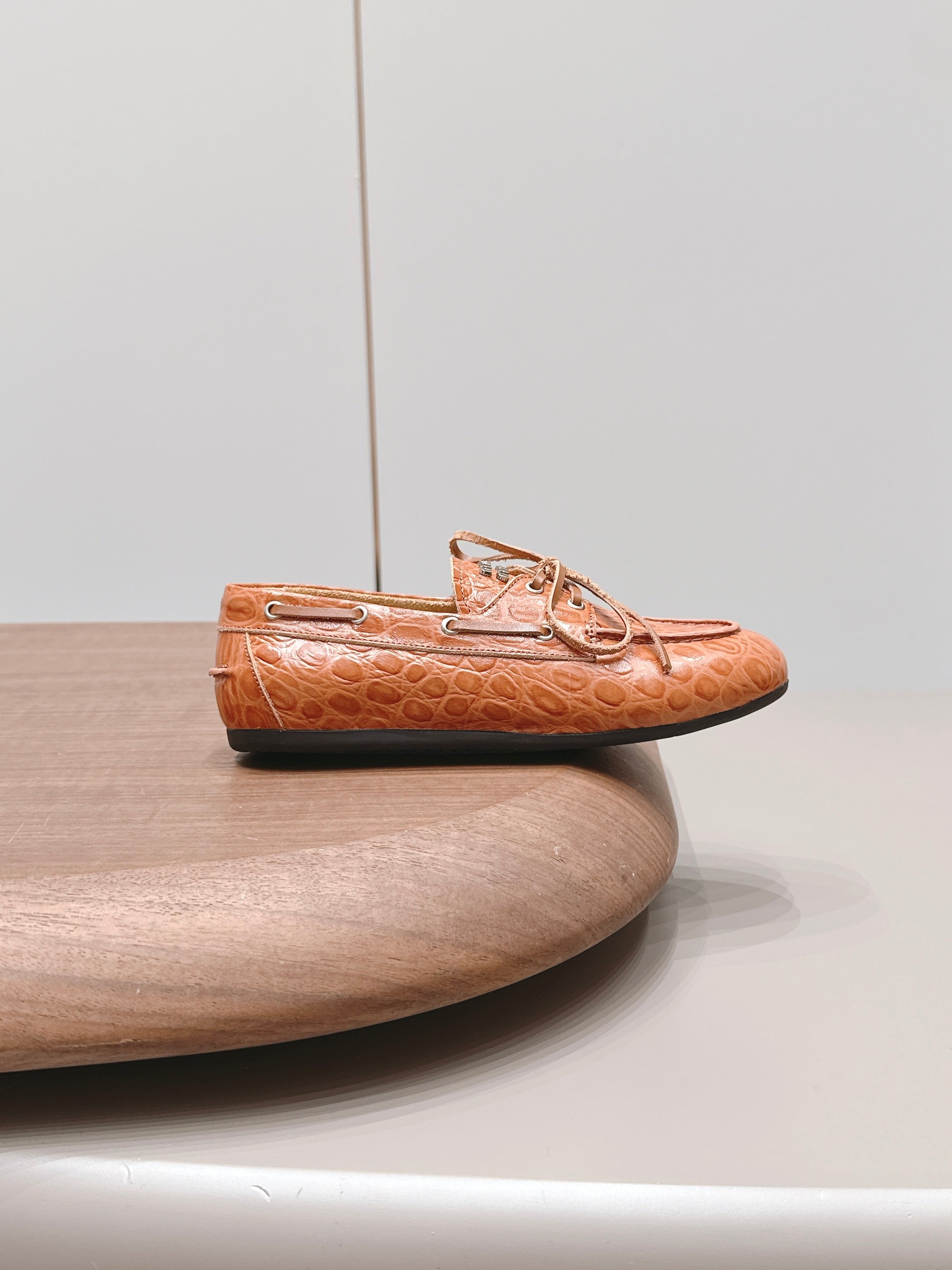 MIUMIU 26S BOAT SHOES IN ORANGE BROWN EMBOSSED CALFSKIN