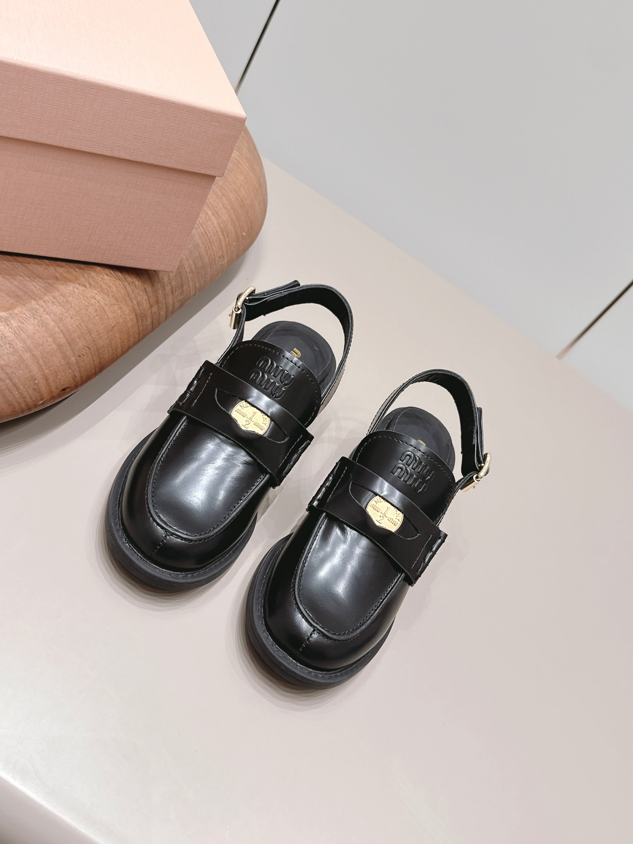 MIUMIU 26S BLOCK HEEL PENNY SLINGBACK LOAFERS 50MM IN BLACK CALFSKIN