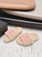 CHANEL 26S SLIDE MULES IN BEIGE SHEARLING AND PINK CC LOGO