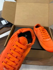 PRADA 25S SNEAKER IN ORANGE SILK