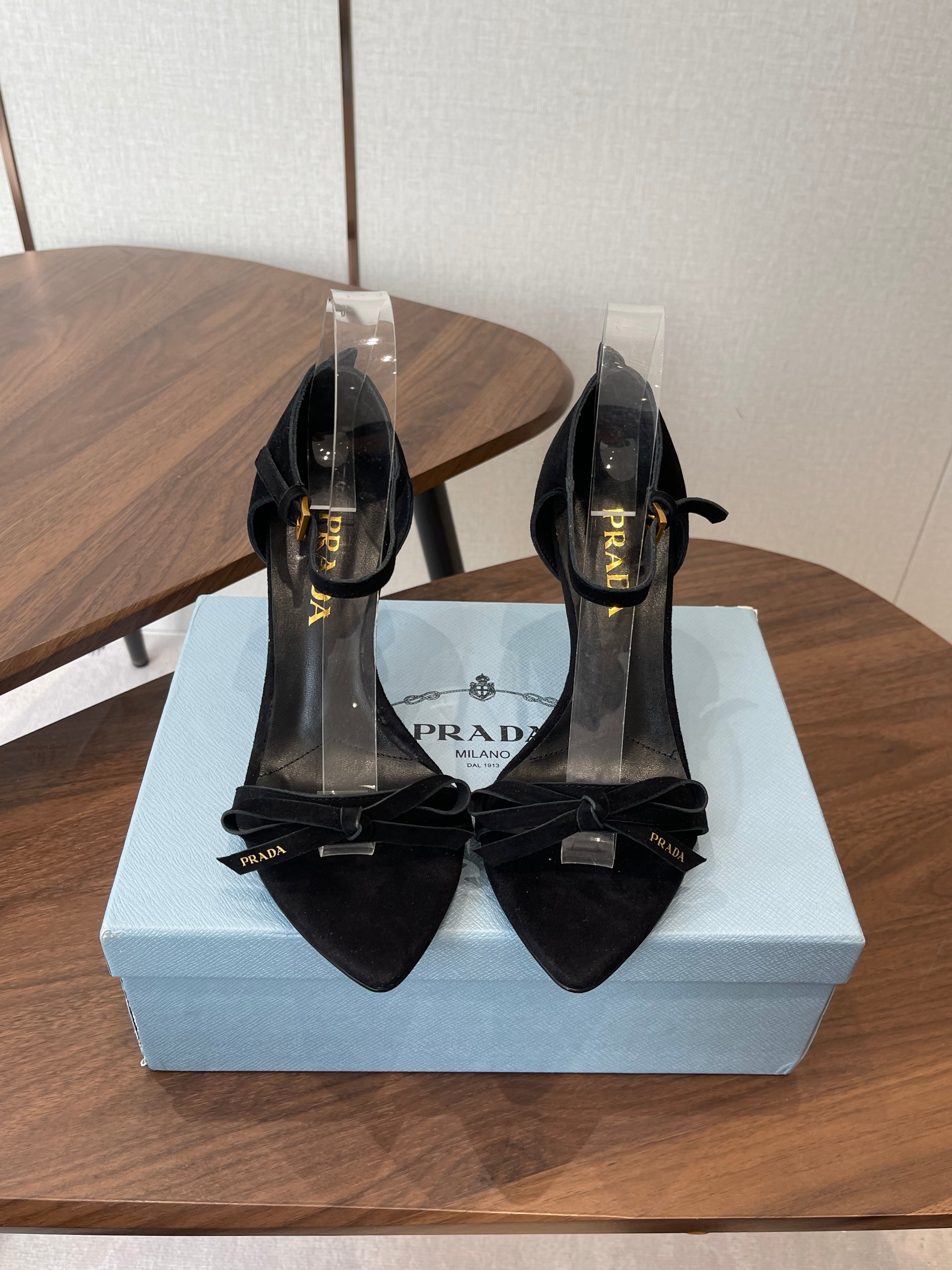 PRADA 26S HIGH HEEL SANDALS 85MM IN BLACK SUEDE WITH BOW