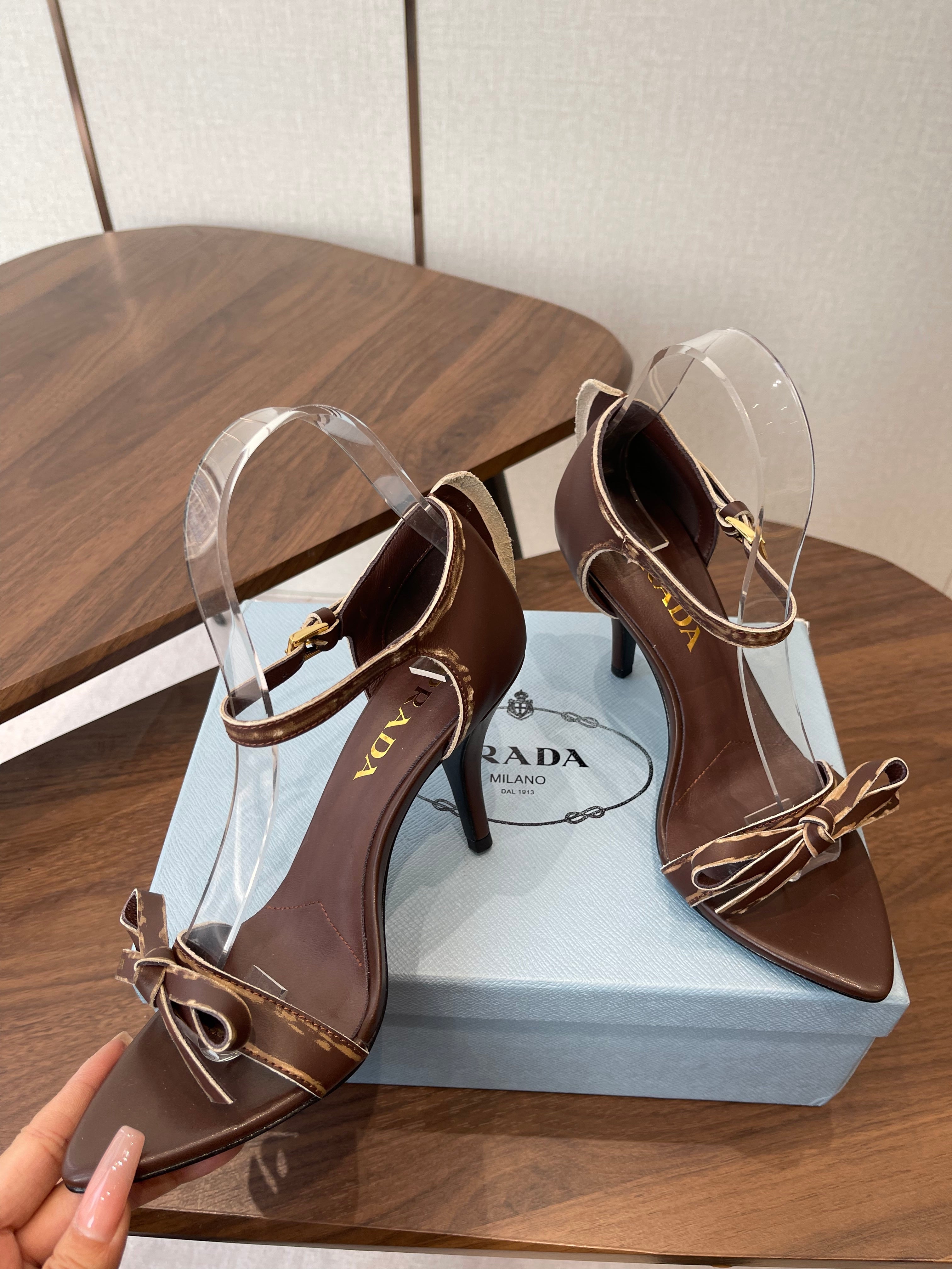 PRADA 26S HIGH HEEL SANDALS 85MM IN CHOCOLATE BROWN CALFSKIN WITH BOW