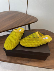 ALAIA 26S FLAT MULES IN DARK YELLOW SUEDE AND MESH RHINESTONE-EMBELLISHED
