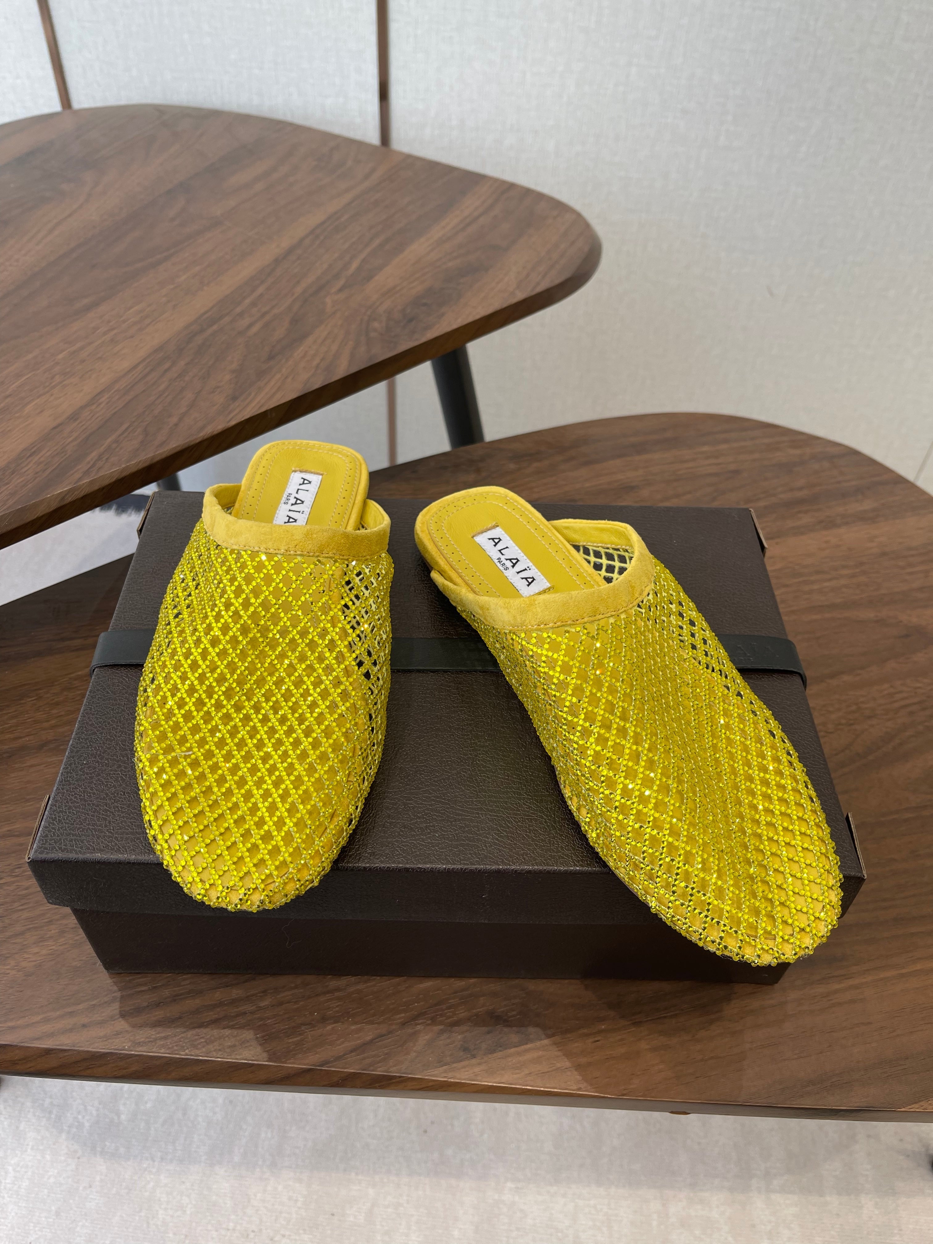 ALAIA 26S FLAT MULES IN DARK YELLOW SUEDE AND MESH RHINESTONE-EMBELLISHED
