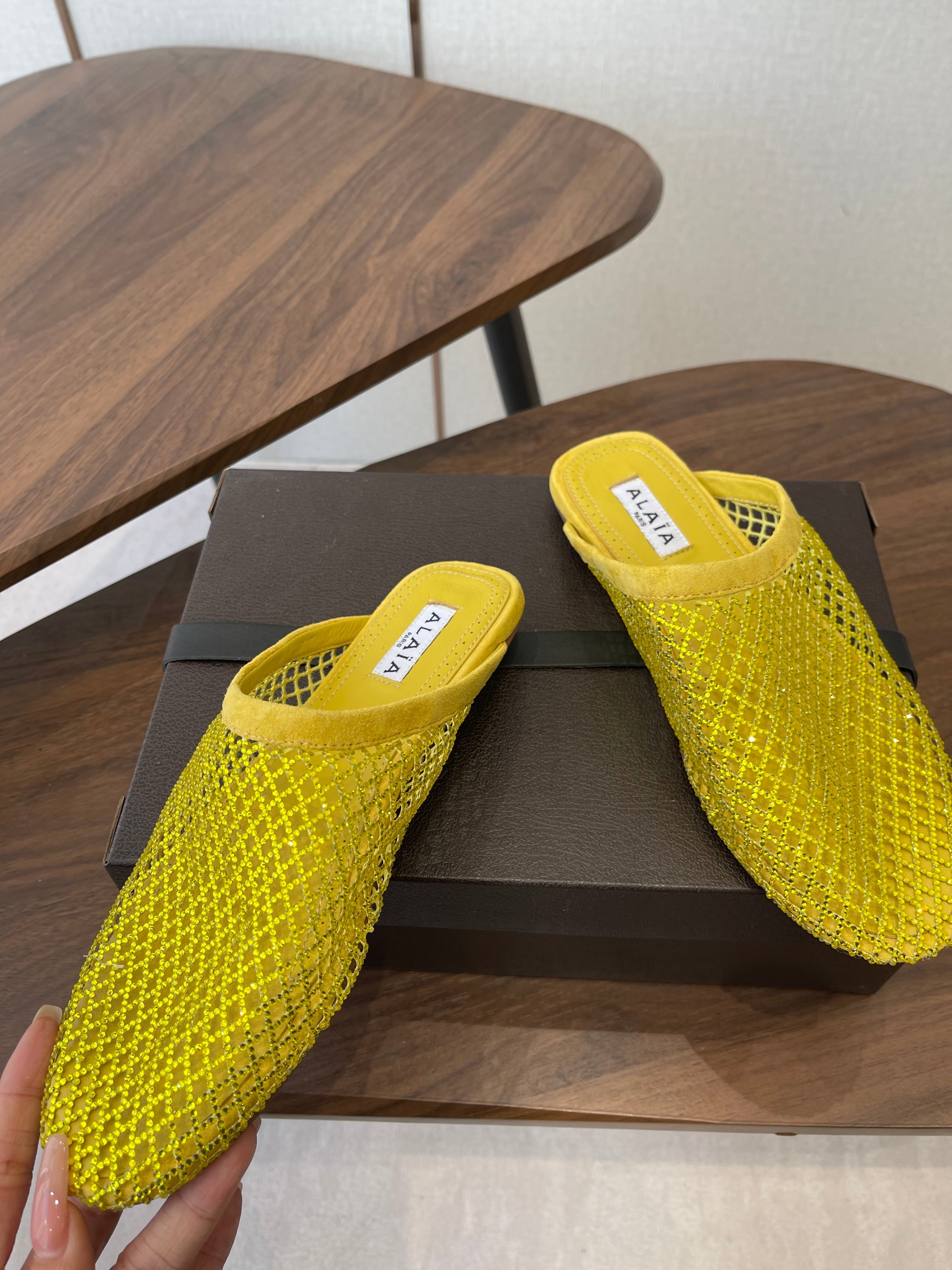 ALAIA 26S FLAT MULES IN DARK YELLOW SUEDE AND MESH RHINESTONE-EMBELLISHED