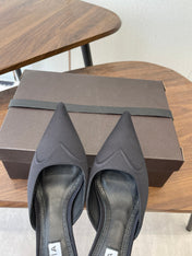 ALAIA 26S HEELED MULES 50 MM IN BLACK FABRIC
