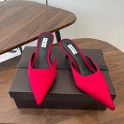 ALAIA 26S HEELED MULES 50 MM IN RED FABRIC
