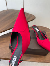 ALAIA 26S HEELED MULES 50 MM IN RED FABRIC