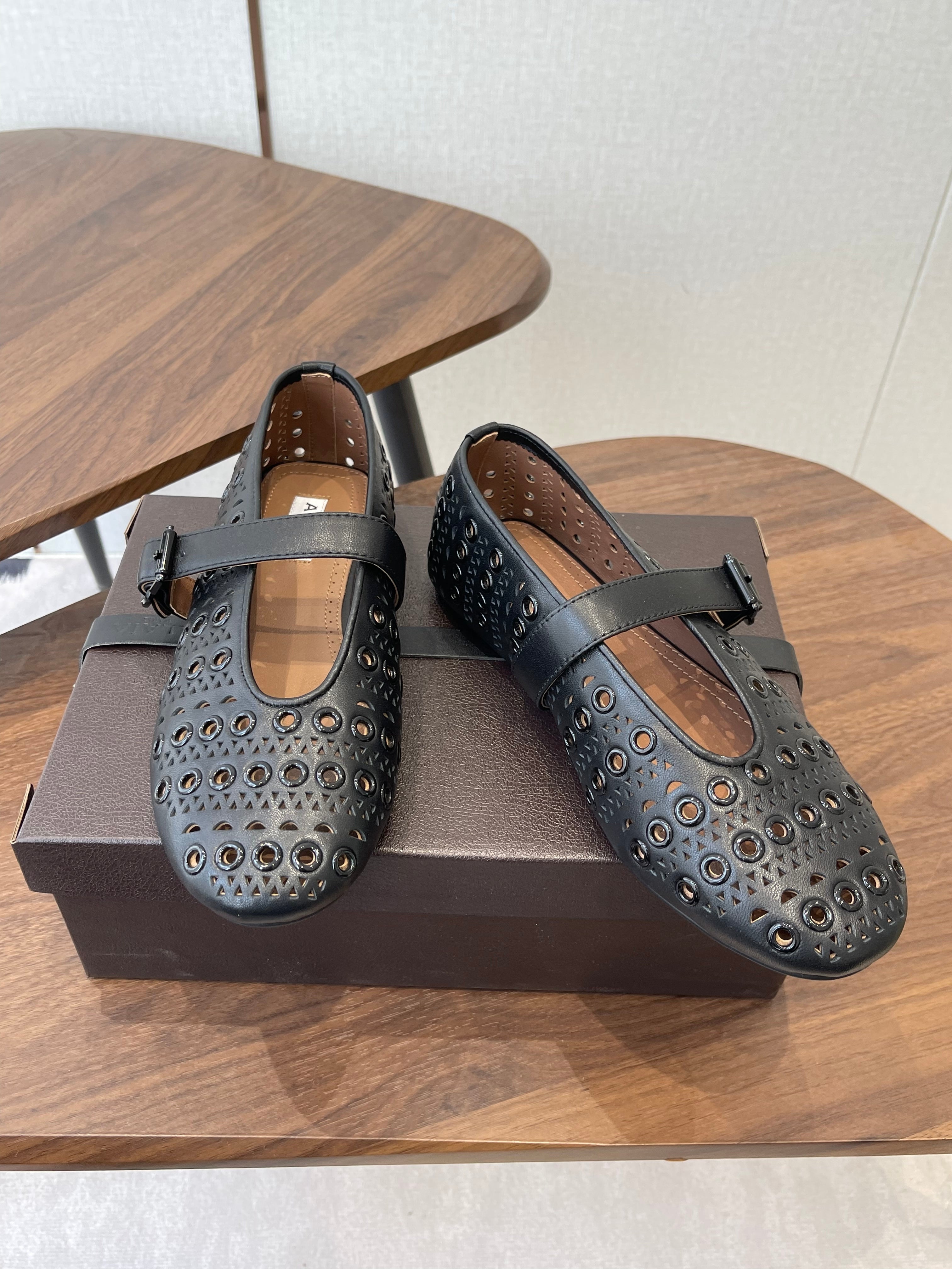ALAIA 26S MARY JANE FLATS IN BLACK LAMBSKIN