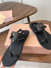 MIUMIU 26S FLIP FLOPS IN BLACK CALFSKIN