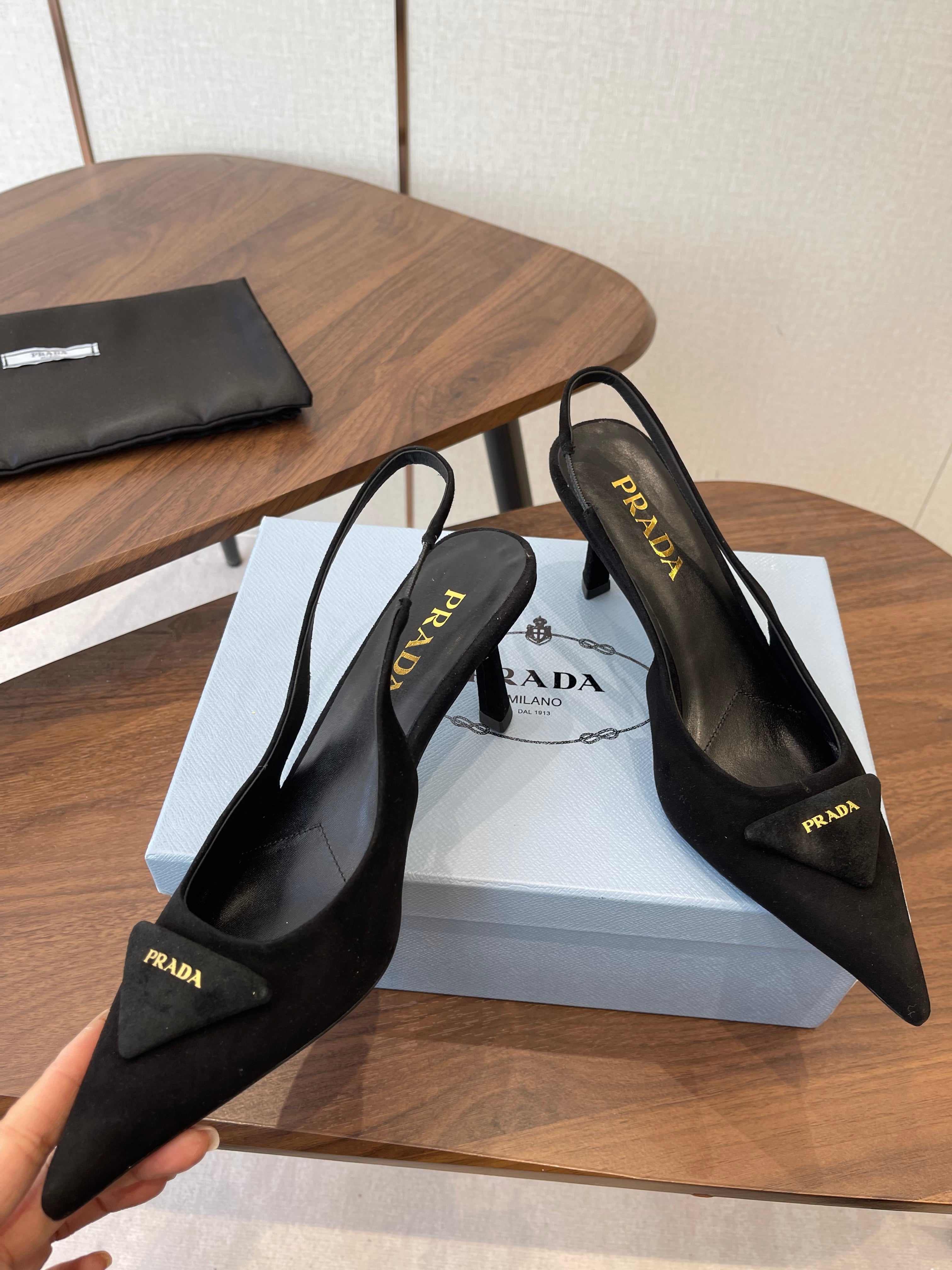 PRADA 26S SLINGBACK PUMPS 75MM IN BLACK SUEDE WITH LOGO