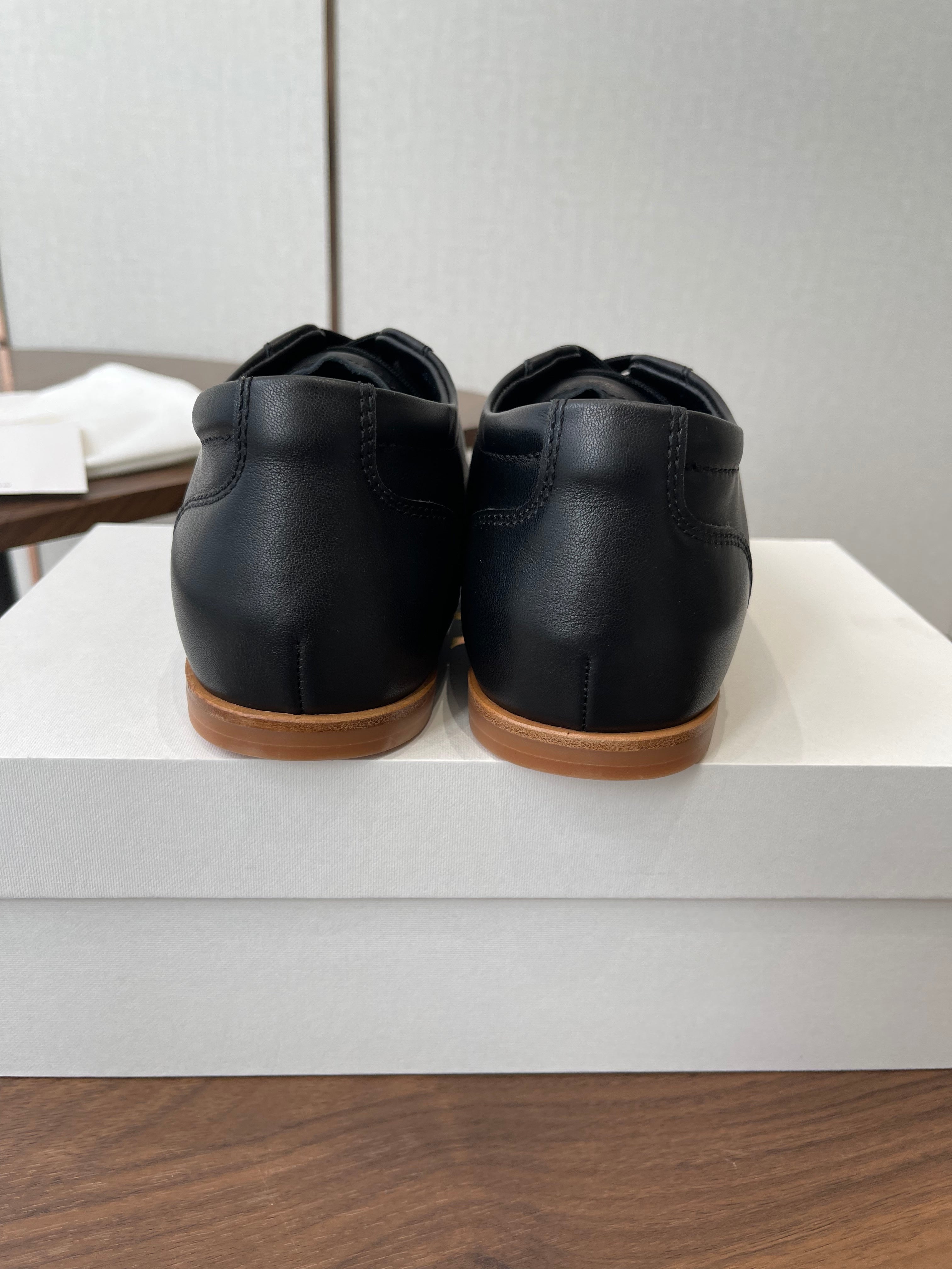 THE ROW 26S SNEAKERS IN BLACK CALFSKIN