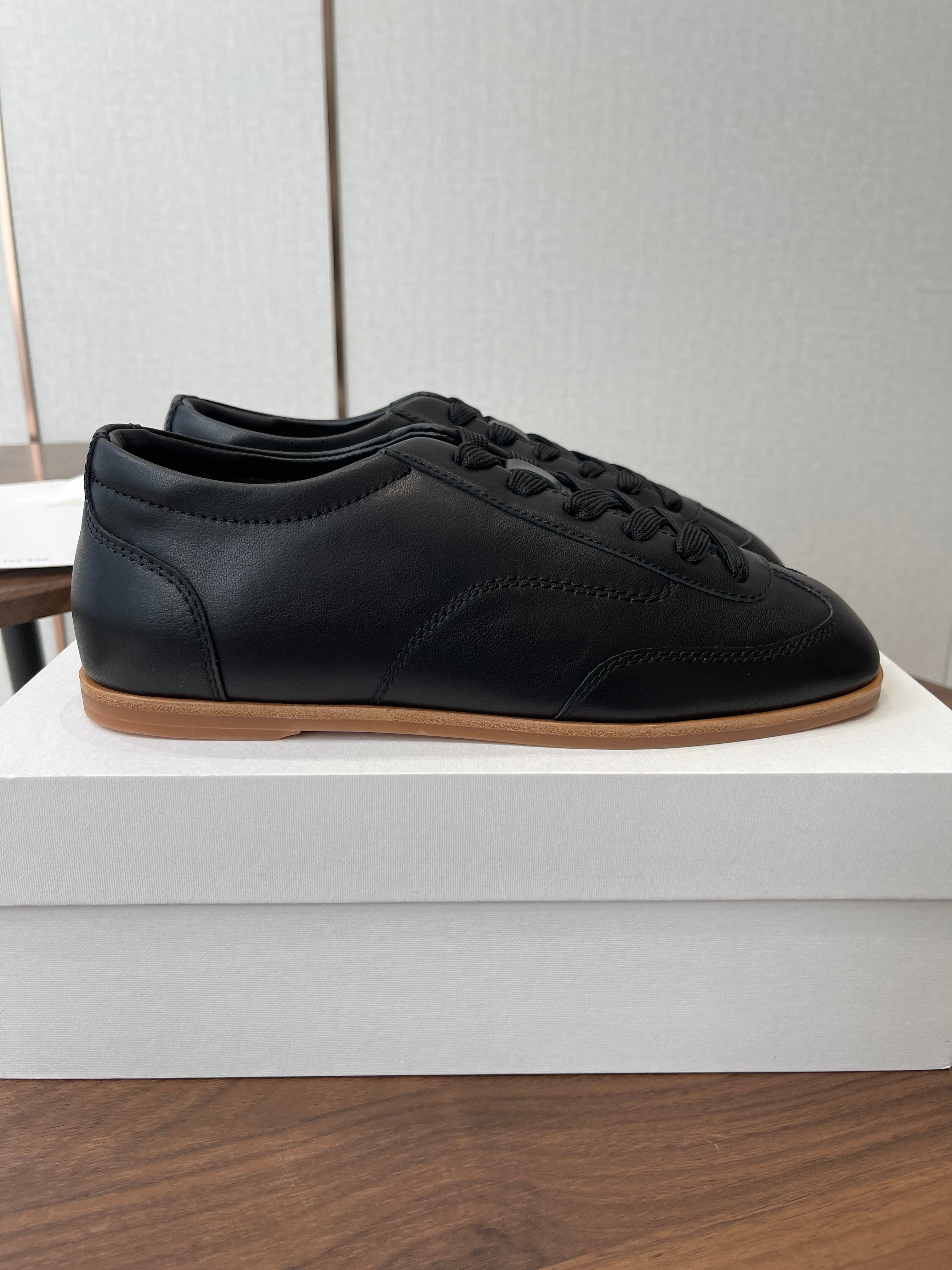 THE ROW 26S SNEAKERS IN BLACK CALFSKIN