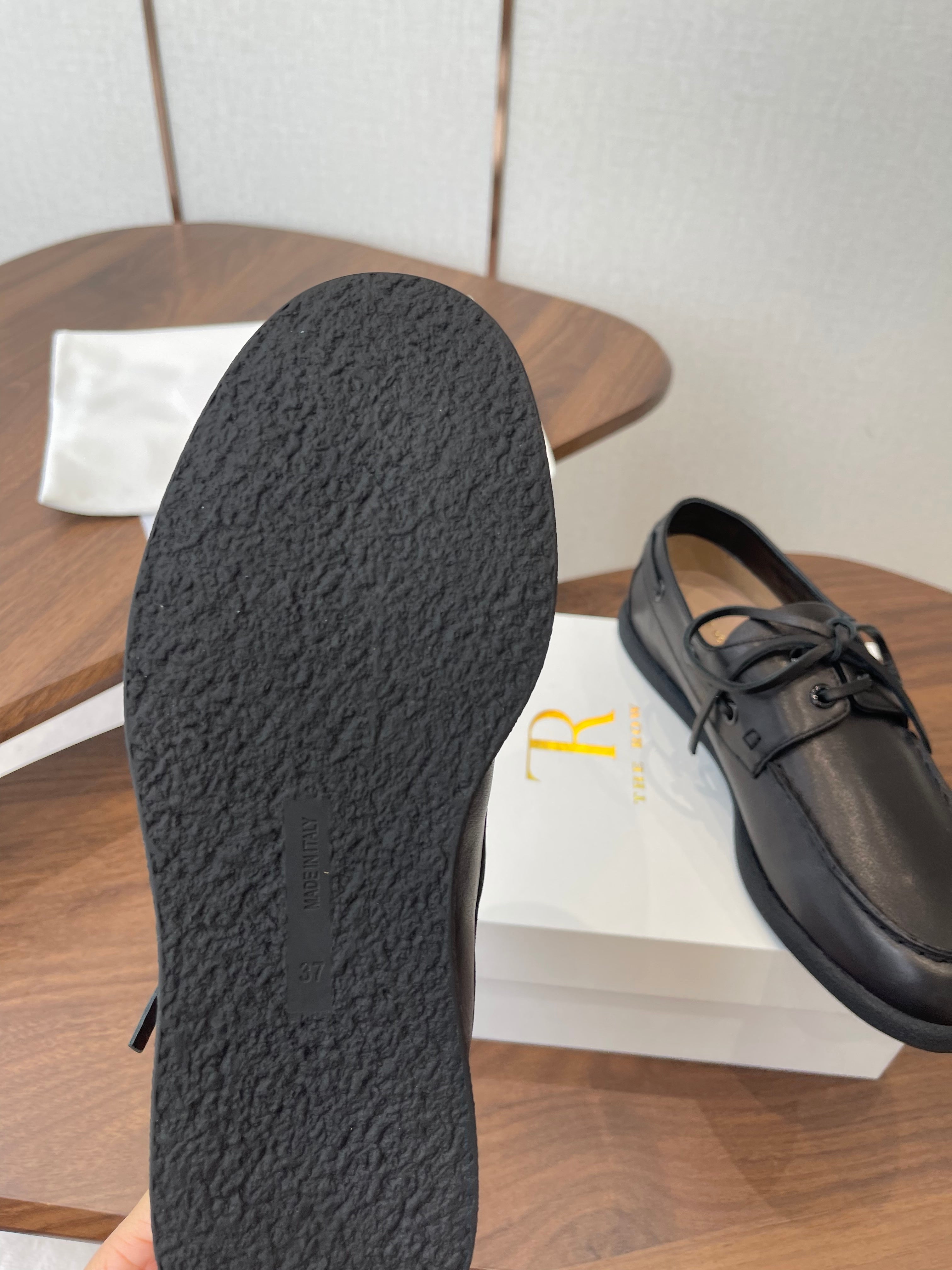 THE ROW 26S LOAFERS IN BLACK CALFSKIN