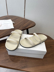 THE ROW 26S DOUBLE STRAP FLAT SANDALS IN IVORY WHITE CALFSKIN