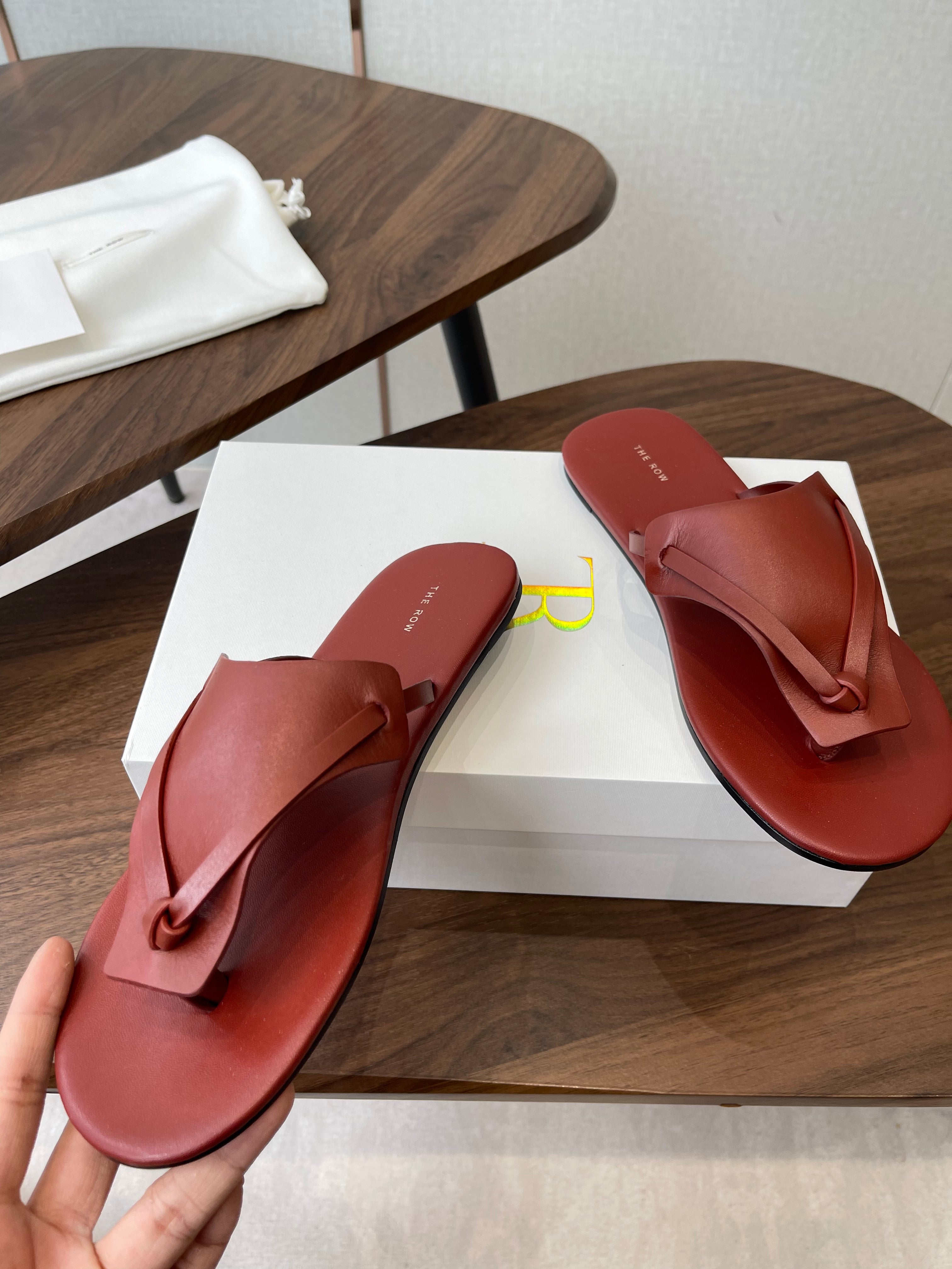 THE ROW 26S T STRAP THONG SANDALS IN RUST RED CALFSKIN